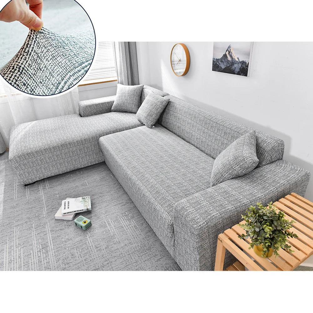 Housse de canapé d'angle extensible gris clair effet chiné