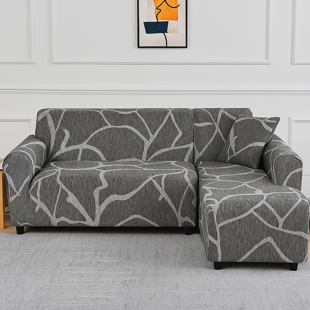 Housse de canapé d'angle grise avec motifs abstraits blancs – extensible et lavable