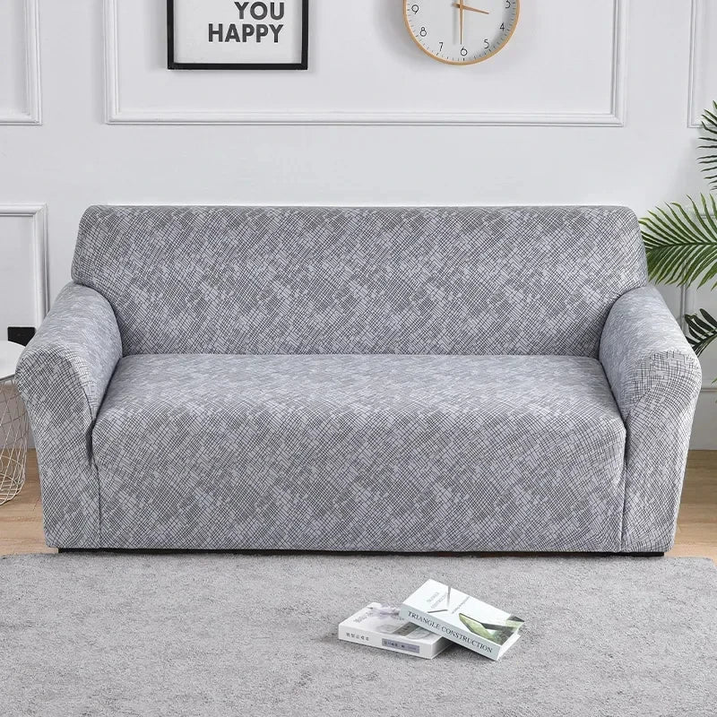 Housse de canapé grise avec motif quadrillé croisé discret