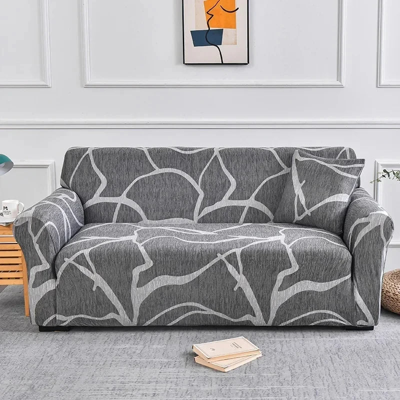 Housse de canapé grise avec motifs abstraits blancs – extensible et lavable
