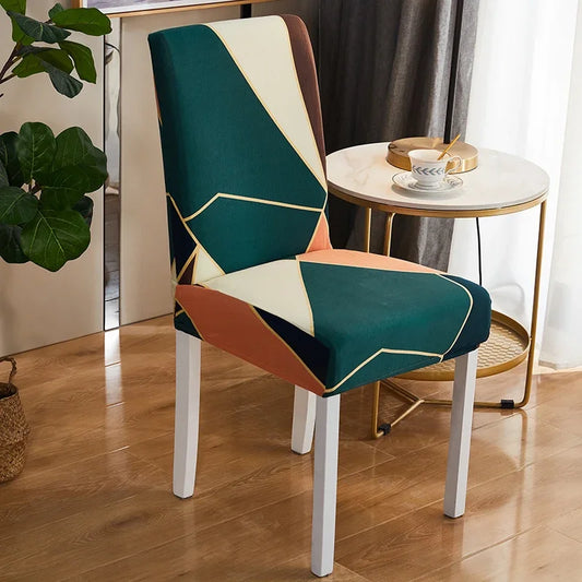 Housse de chaise extensible aux motifs géométriques vert, corail et crème