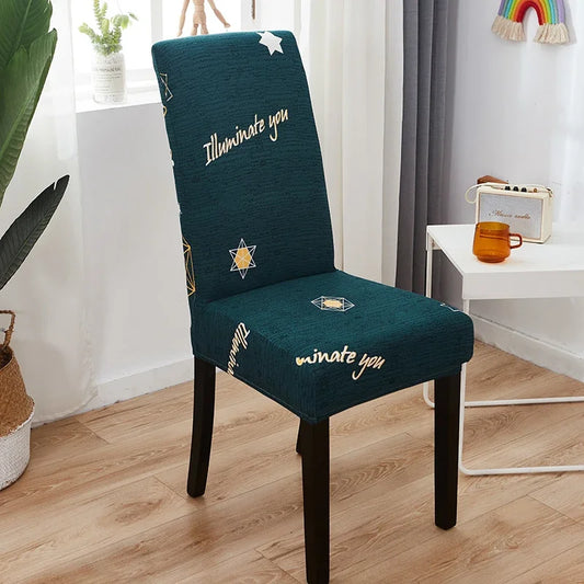 Housse de chaise extensible vert foncé avec étoiles et texte "Illuminate you"