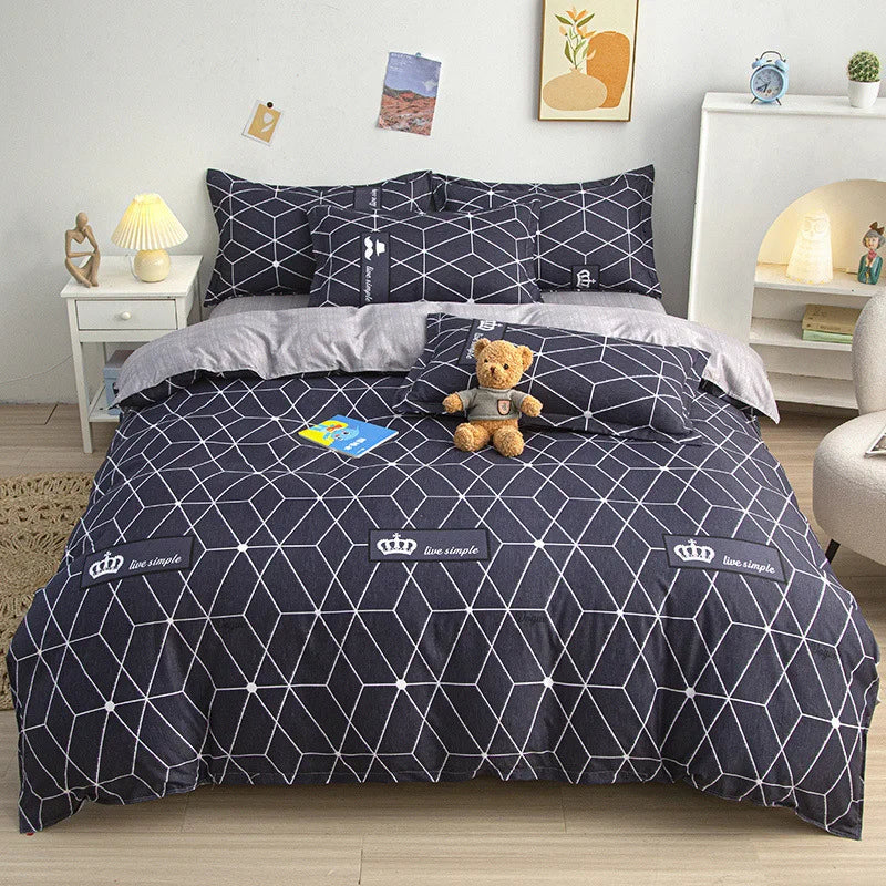 Housse de couette noire imprimée motif géométrique blanc sur lit double