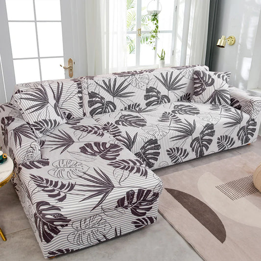 Housse de Canapé d’Angle Extensible – Feuilles Tropicales Noires sur Fond Blanc
