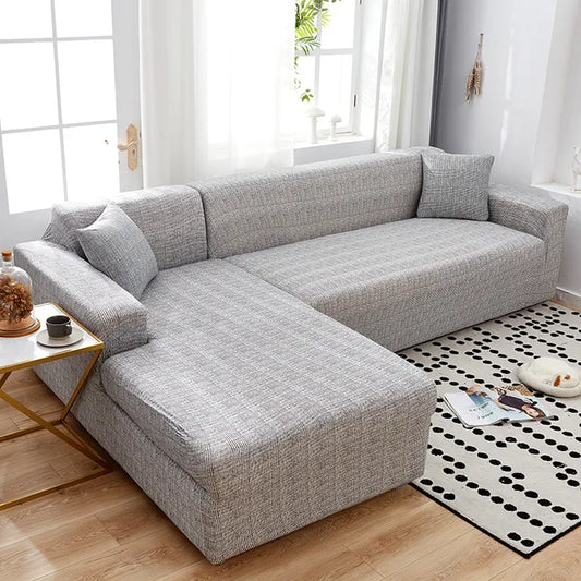 Housse de canapé d'angle extensible gris clair effet chiné