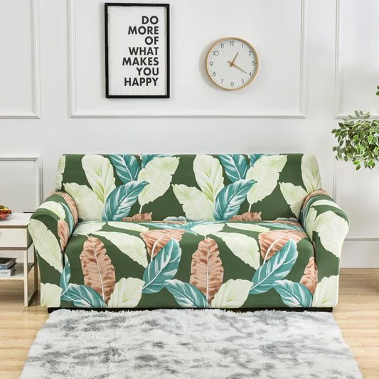 Housse de canapé extensible motif feuilles tropicales vertes et beiges – ambiance naturelle et moderne