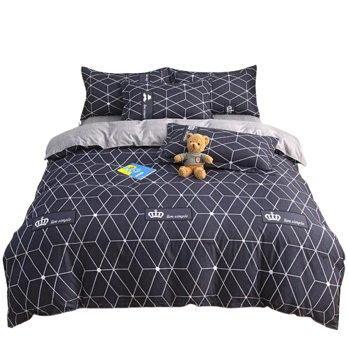 Housse de couette noire imprimée motif géométrique blanc sur lit double avec taies d’oreiller assorties.