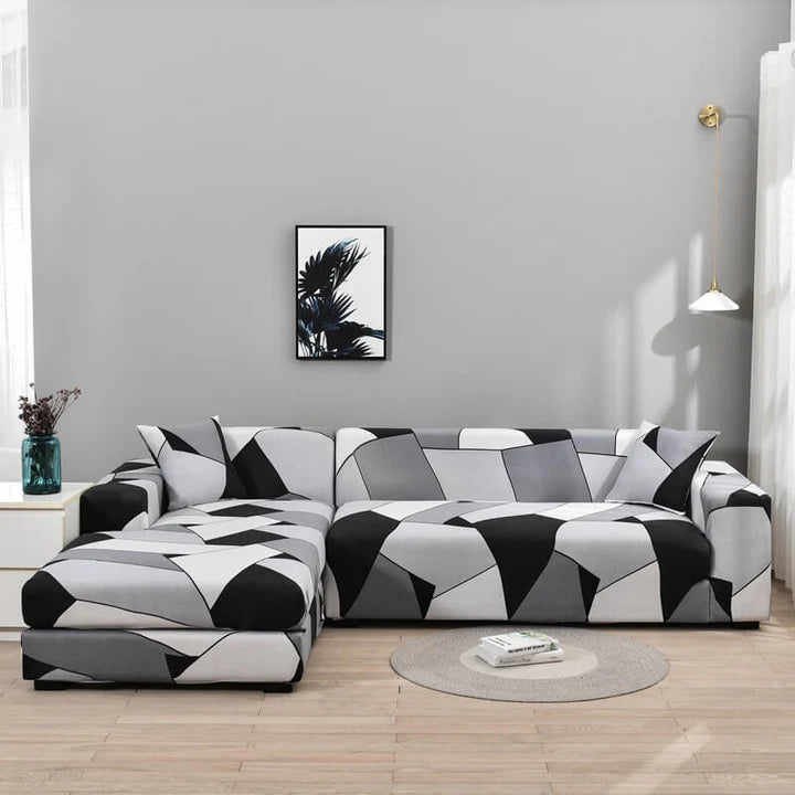Housse extensible pour canapé d’angle au motif géométrique noir, gris et blanc