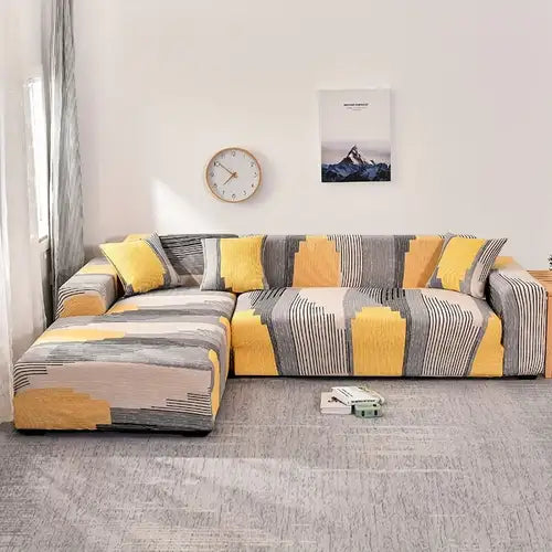 Housse extensible pour canapé d’angle avec motif graphique jaune et gris moderne